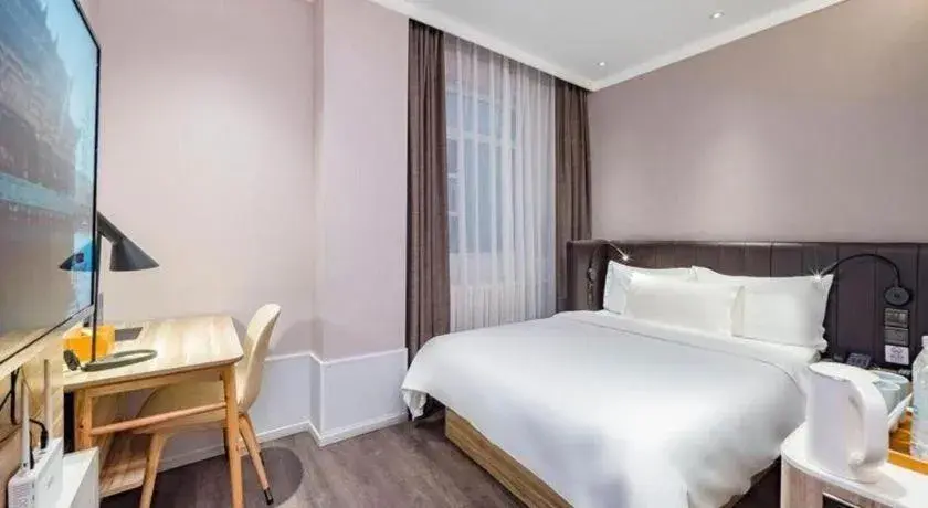 Bed in Hanting Premium Hotel Beijing Wudaokou East Gate of Tsinghua Bed in Hanting Premium Hotel Beijing Wudaokou East Gate of Tsinghua