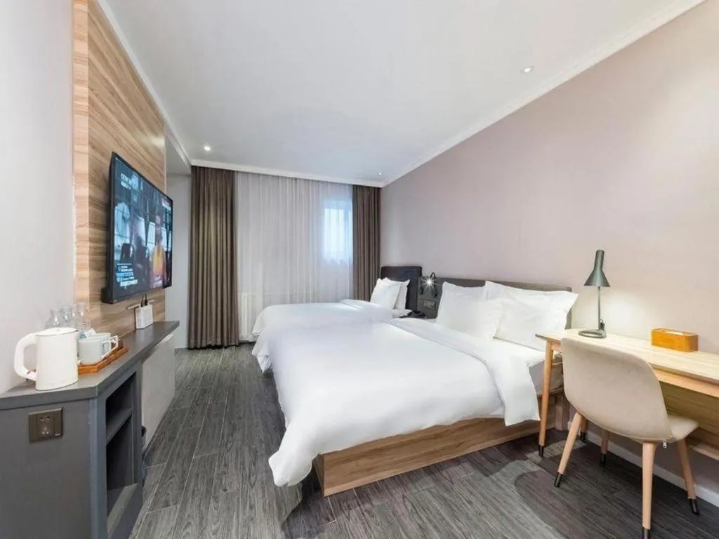 Bed in Hanting Premium Hotel Beijing Wudaokou East Gate of Tsinghua