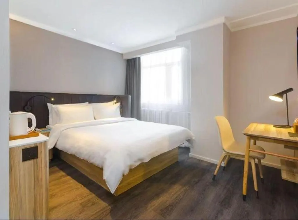 Bed in Hanting Premium Hotel Beijing Wudaokou East Gate of Tsinghua