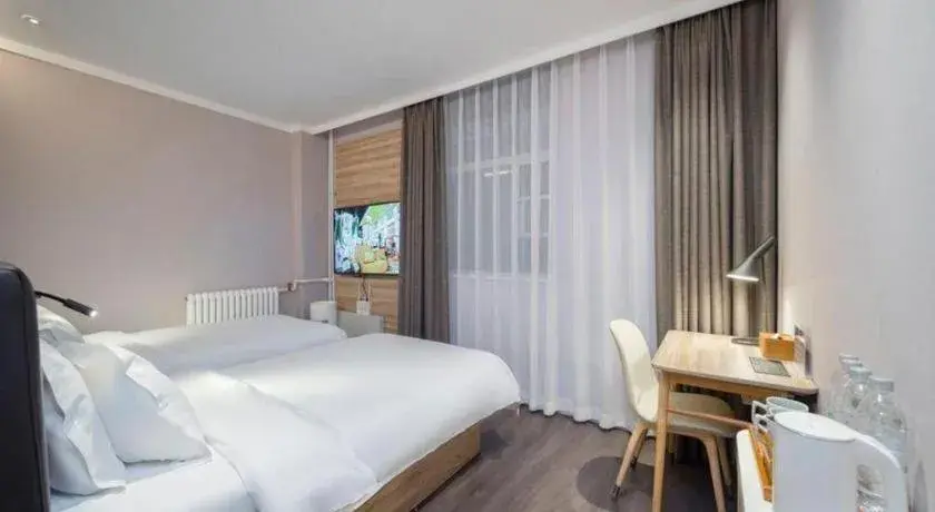 Bed in Hanting Premium Hotel Beijing Wudaokou East Gate of Tsinghua Bed in Hanting Premium Hotel Beijing Wudaokou East Gate of Tsinghua