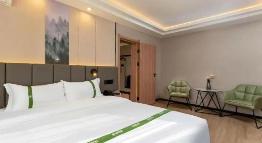 Bed in GreenTree Inn Jinan Quancheng Hotel