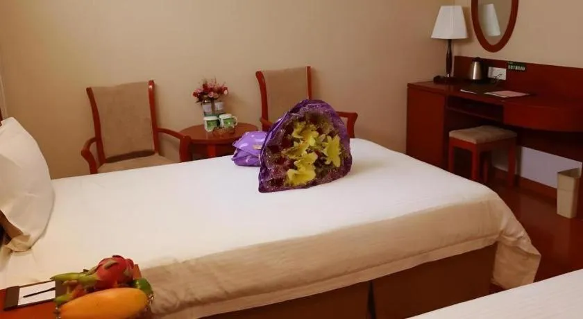 Bed in GreenTree Inn Jinan Quancheng Hotel