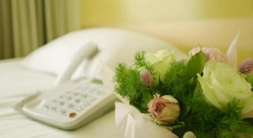 Bed in GreenTree Inn Jinan Quancheng Hotel