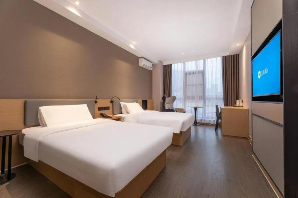 Bed in GreenTree Inn JiangSu NanJing South Railway Station South Square Express Hotel
