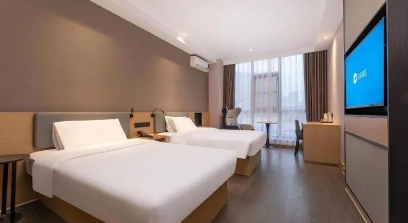 Bed in GreenTree Inn JiangSu NanJing South Railway Station South Square Express Hotel