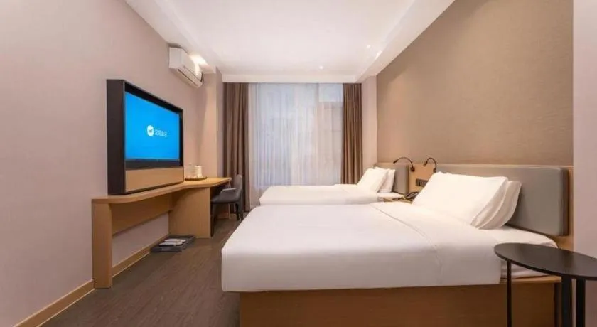 Bed in GreenTree Inn JiangSu NanJing South Railway Station South Square Express Hotel