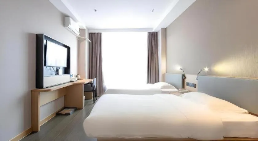 Bed in GreenTree Inn JiangSu NanJing South Railway Station South Square Express Hotel