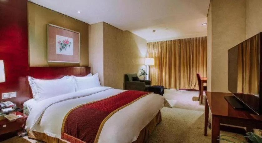 Bed in Shanxi World Trade Hotel