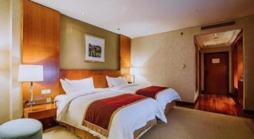 Bed in Shanxi World Trade Hotel