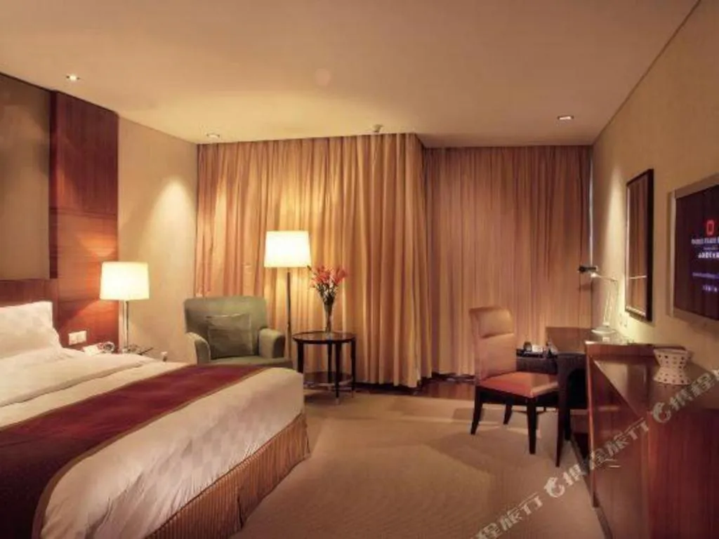 Bed in Shanxi World Trade Hotel