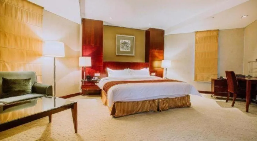 Bed in Shanxi World Trade Hotel