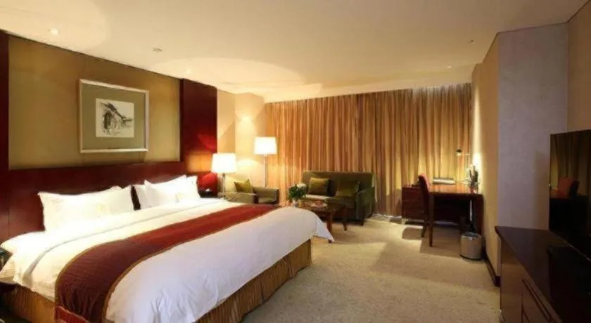 Bed in Shanxi World Trade Hotel