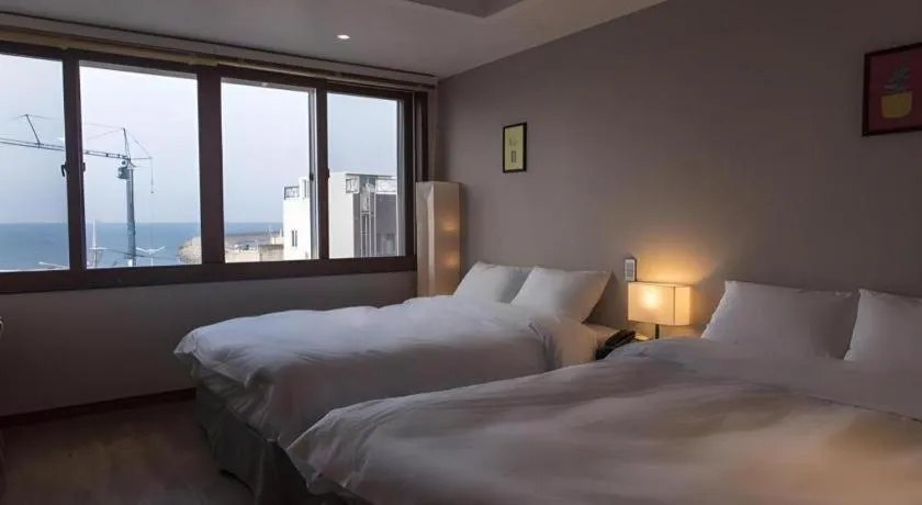 Bed in Check Inn Hotel