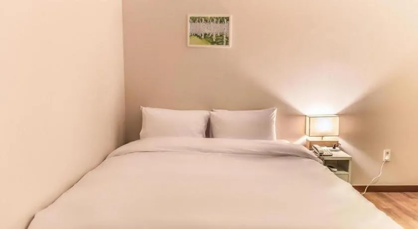 Bed in Check Inn Hotel