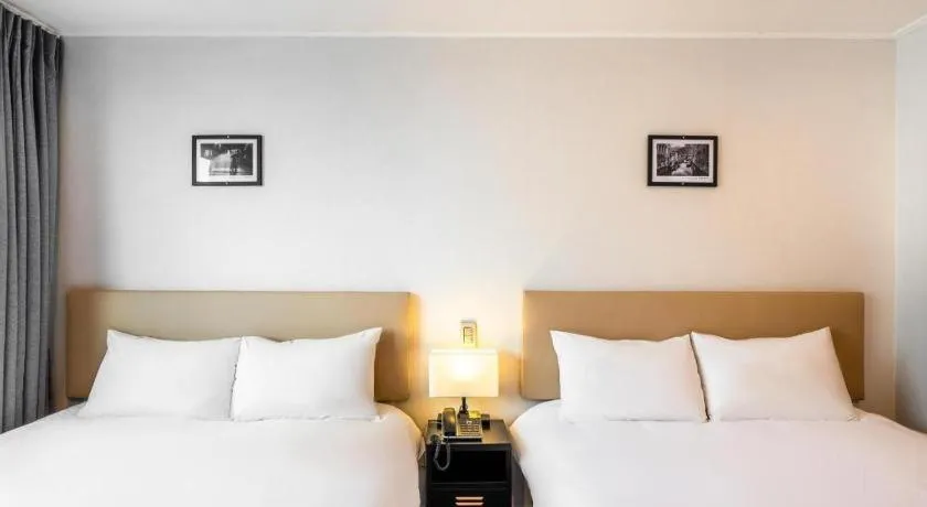 Bed in Check Inn Hotel