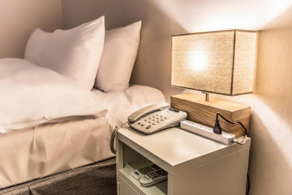 Bed in Check Inn Hotel