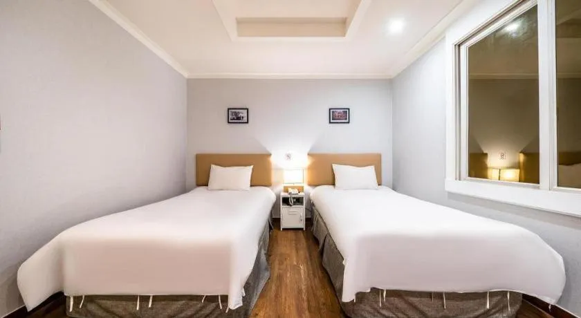 Bed in Check Inn Hotel