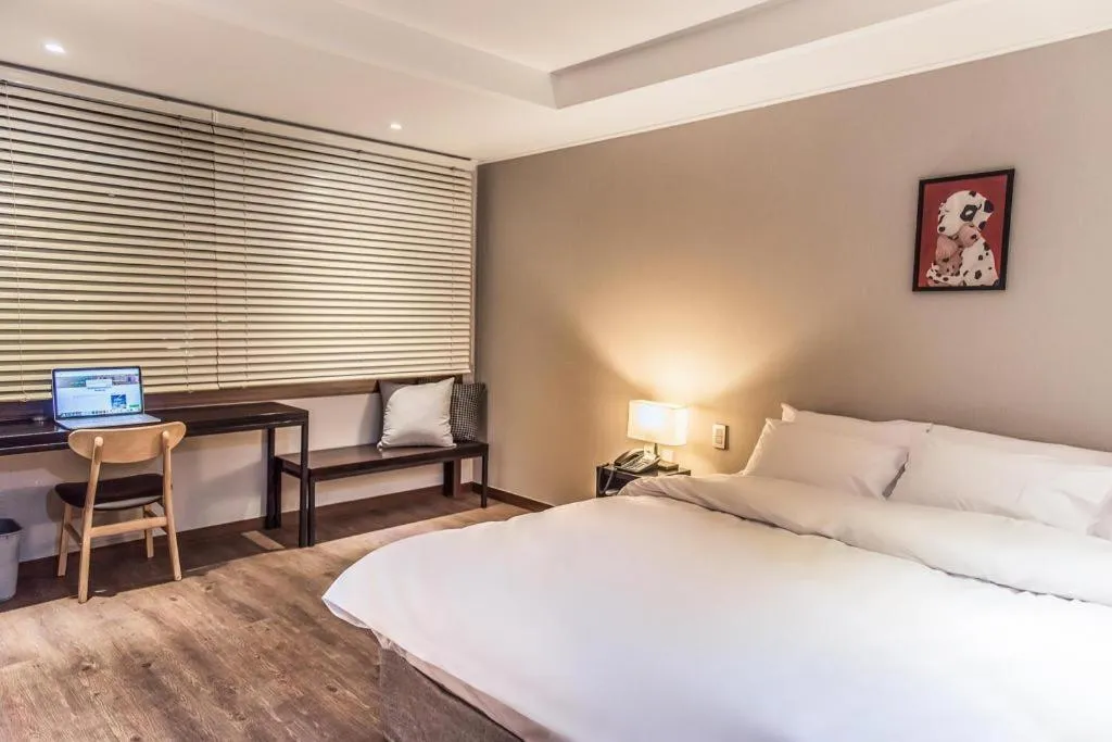 Bed in Check Inn Hotel