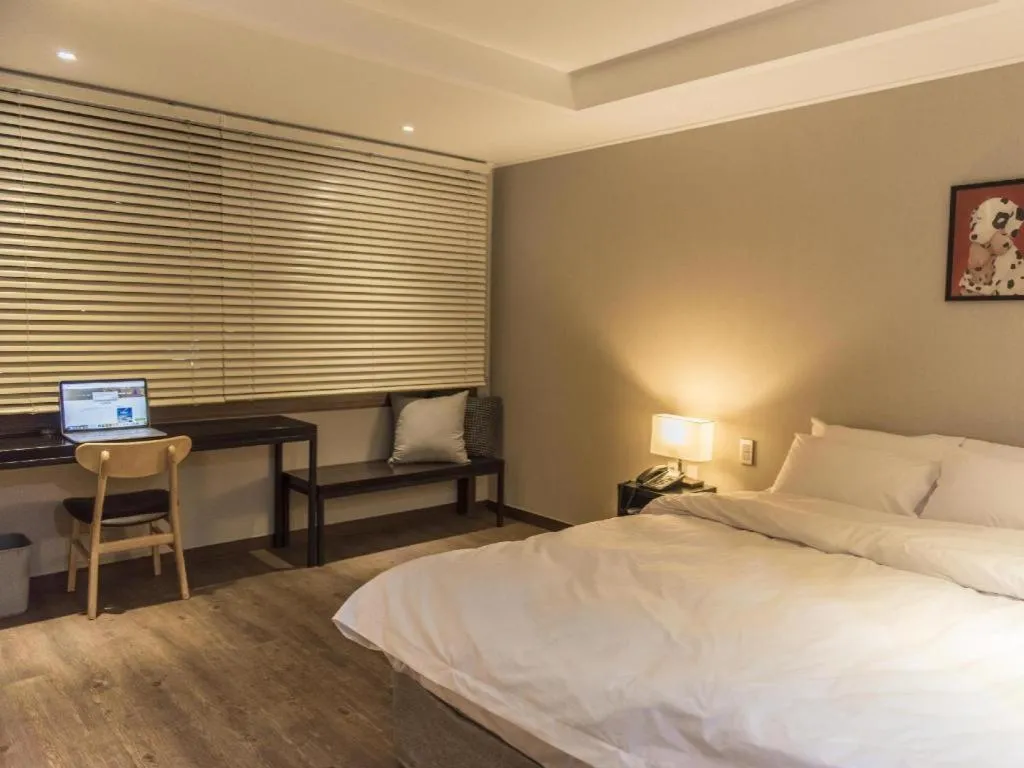 Bed in Check Inn Hotel