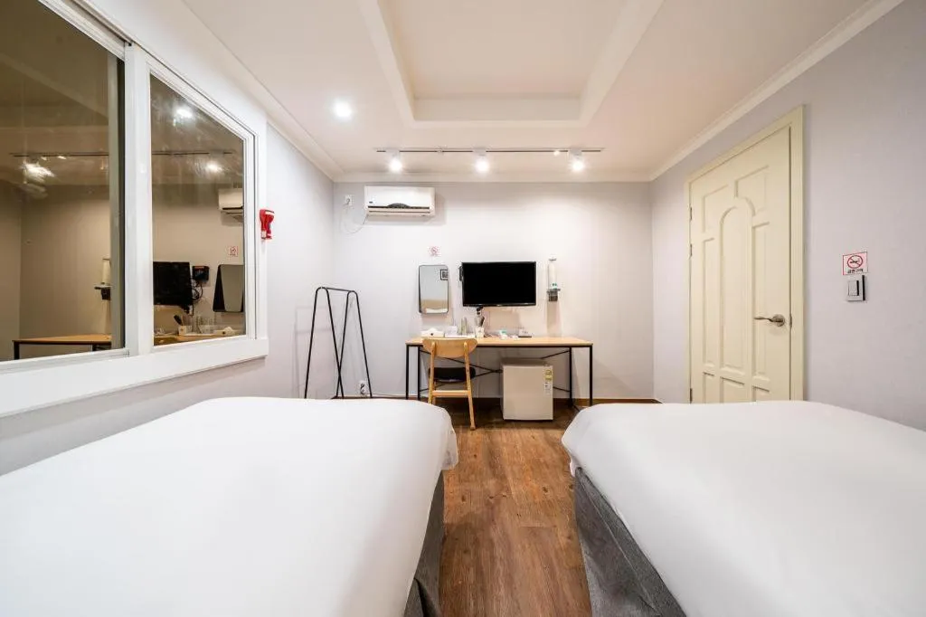 Bed in Check Inn Hotel