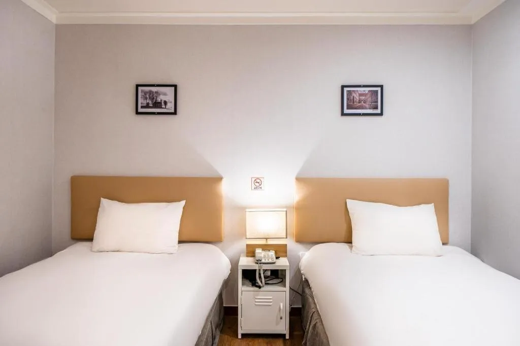 Bed in Check Inn Hotel