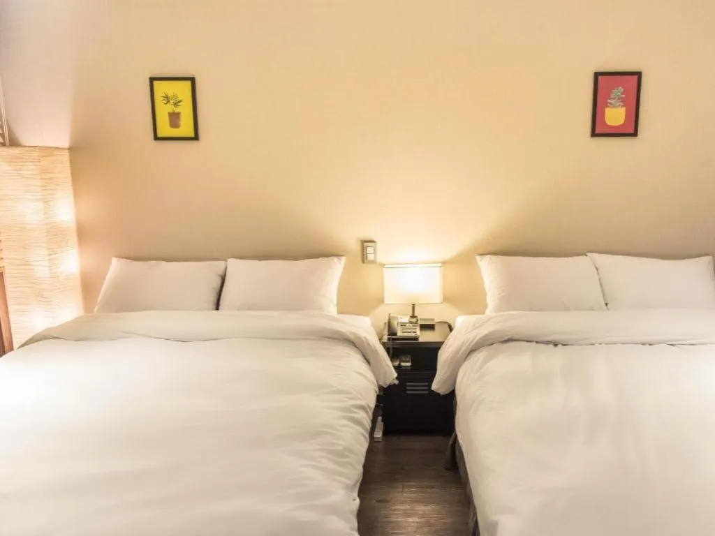 Bed in Check Inn Hotel