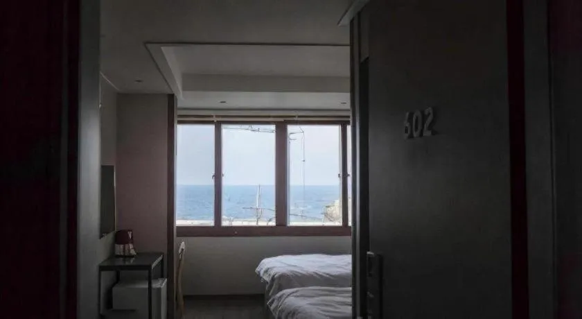 Bed in Check Inn Hotel