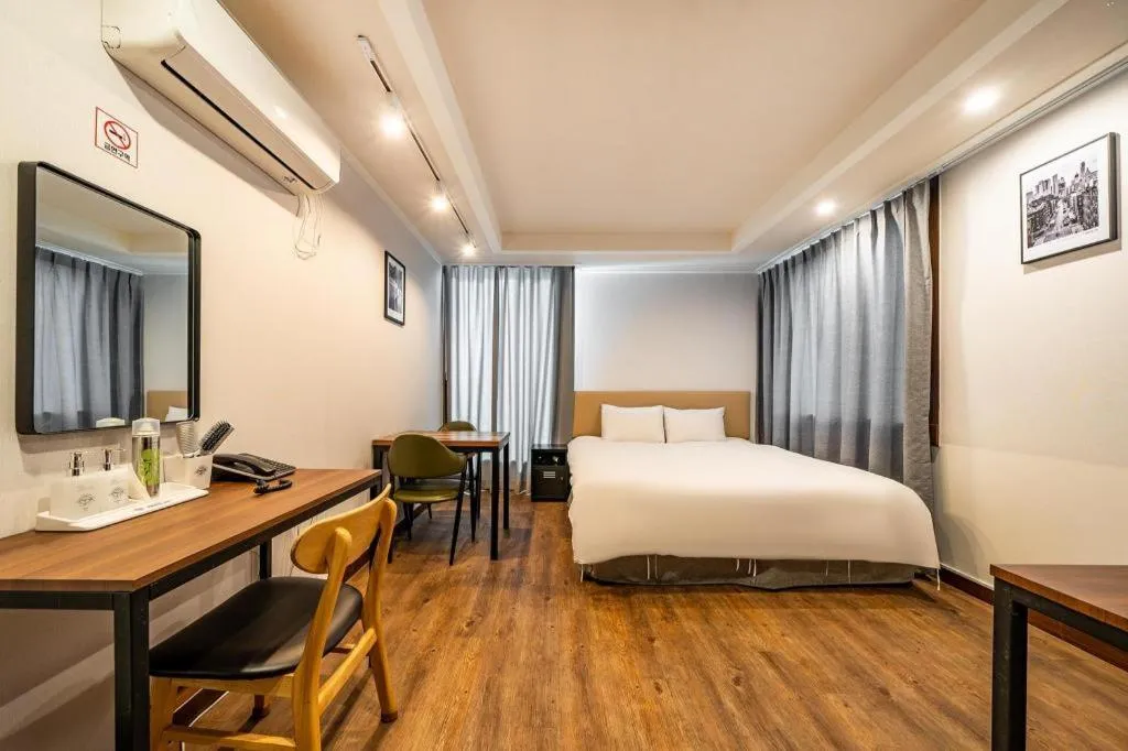 Bed in Check Inn Hotel