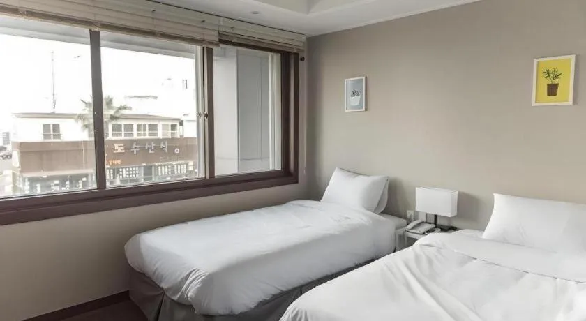 Bed in Check Inn Hotel