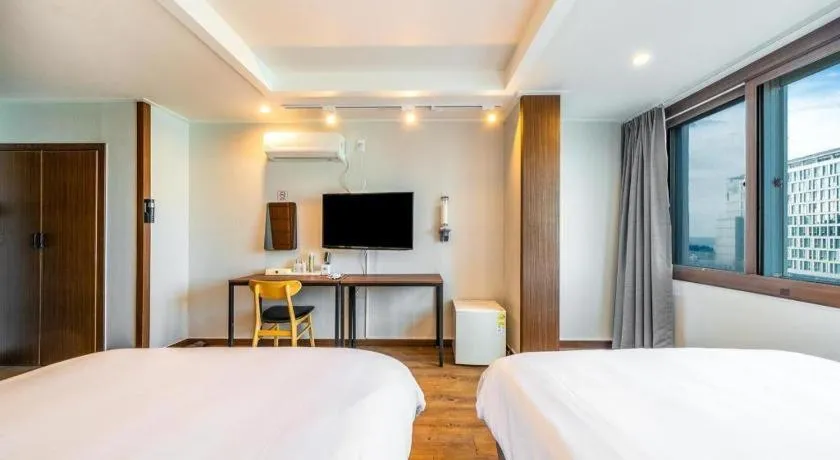 Bed in Check Inn Hotel