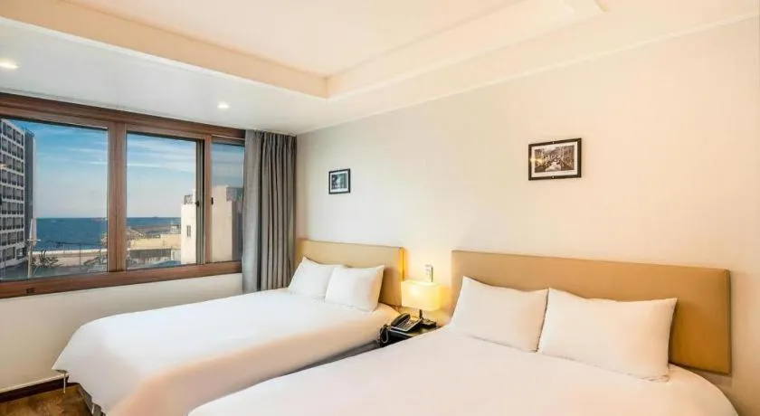 Bed in Check Inn Hotel