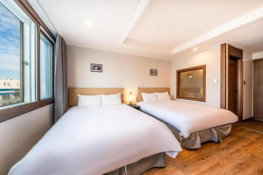 Bed in Check Inn Hotel