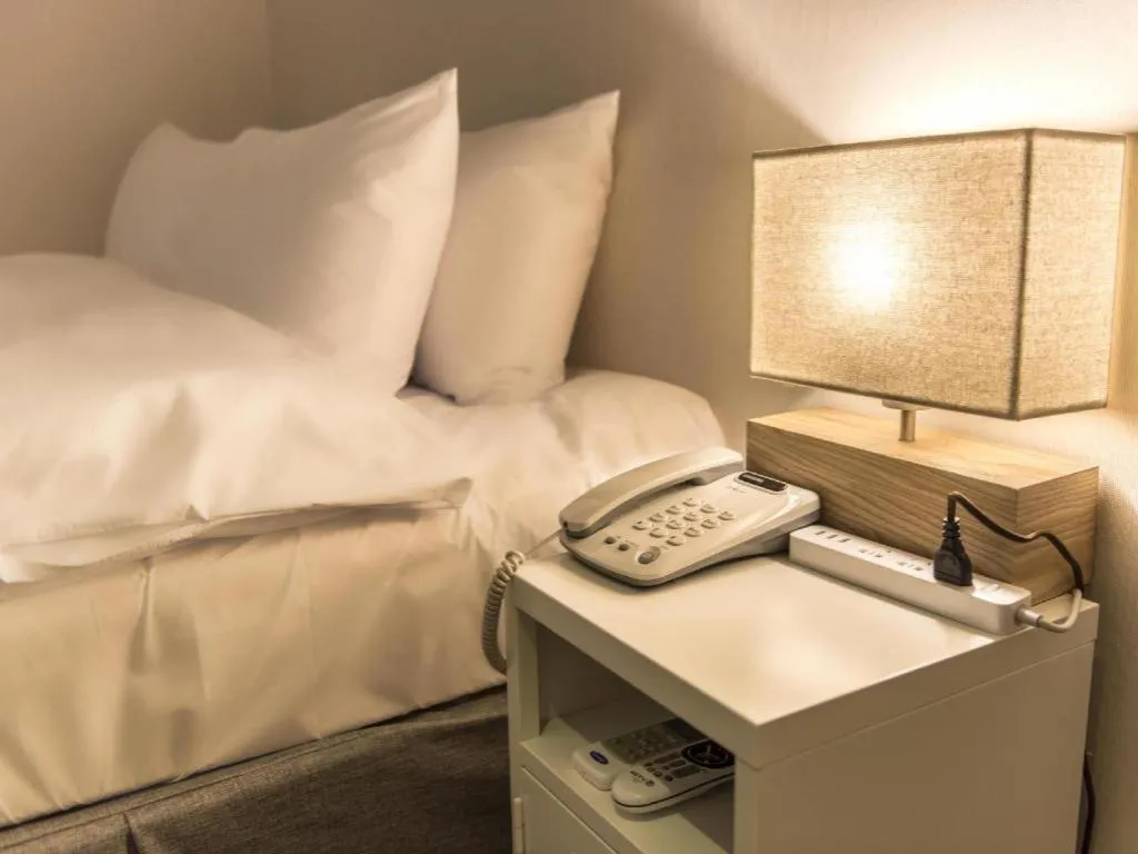 Bed in Check Inn Hotel