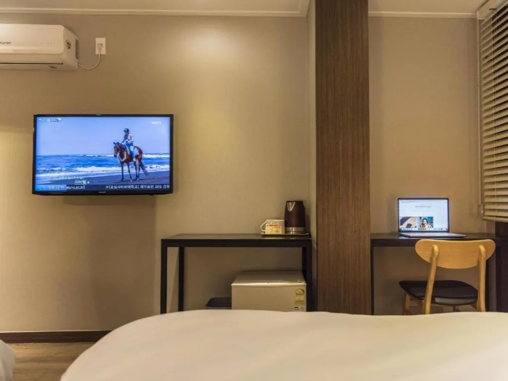 Bed in Check Inn Hotel