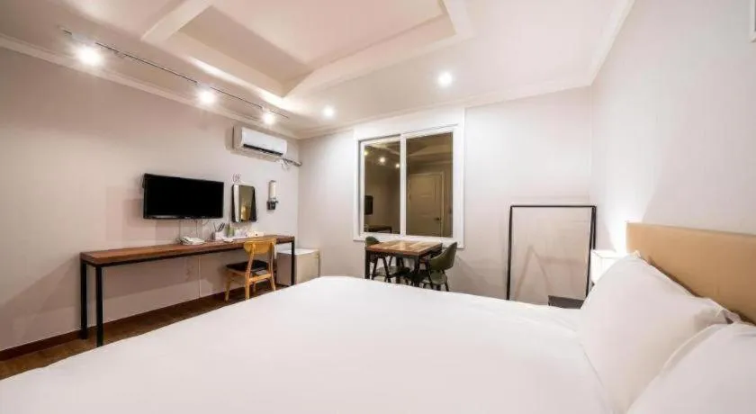 Bed in Check Inn Hotel