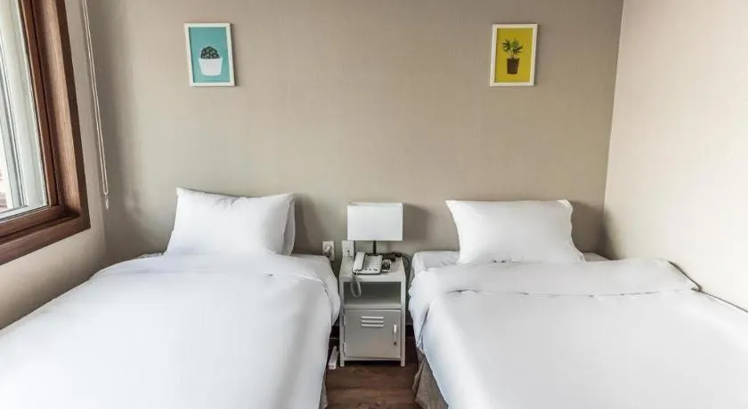 Bed in Check Inn Hotel