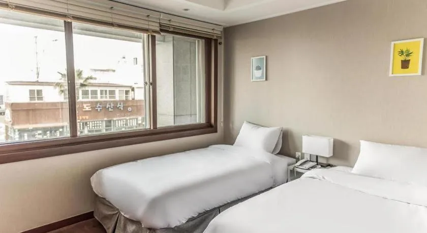 Bed in Check Inn Hotel