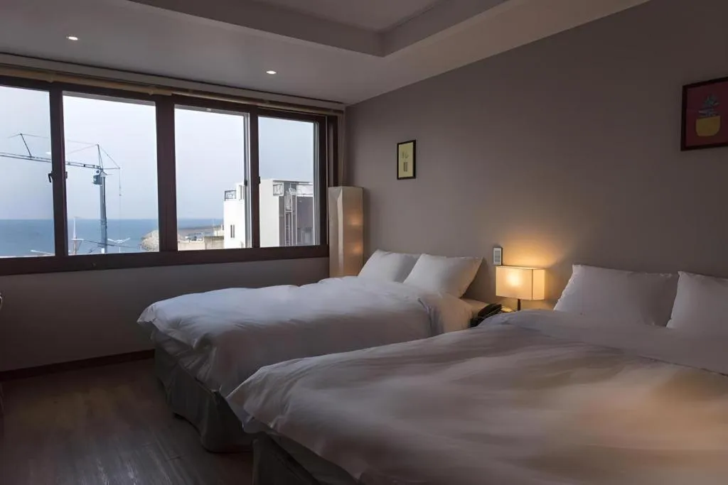 Bed in Check Inn Hotel