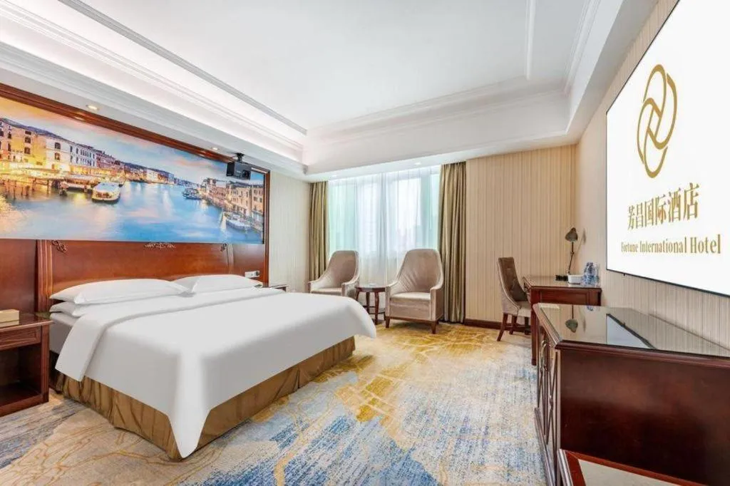 Bed in Vienna International Hotel Guangzhou Tianhe Olympic Stadium Dongpu