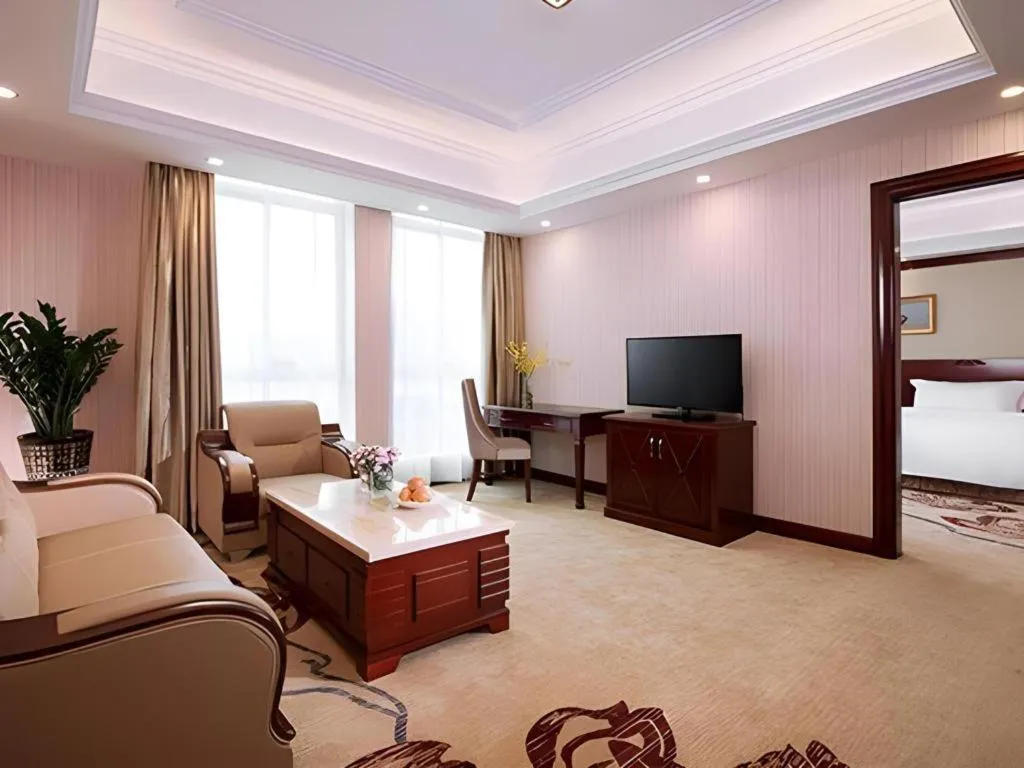 Bed in Vienna International Hotel Guangzhou Tianhe Olympic Stadium Dongpu