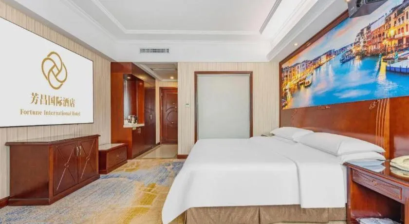 Bed in Vienna International Hotel Guangzhou Tianhe Olympic Stadium Dongpu