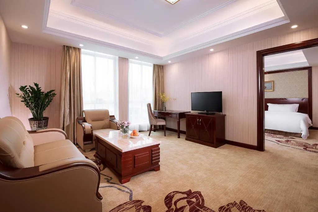 Bed in Vienna International Hotel Guangzhou Tianhe Olympic Stadium Dongpu