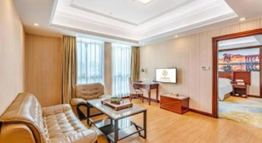 Bed in Vienna International Hotel Guangzhou Tianhe Olympic Stadium Dongpu