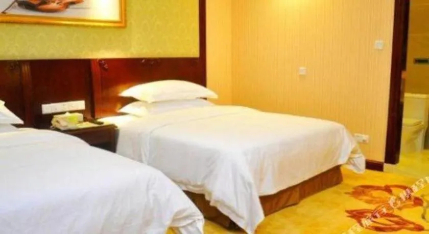 Bed in Vienna International Hotel Guangzhou Tianhe Olympic Stadium Dongpu