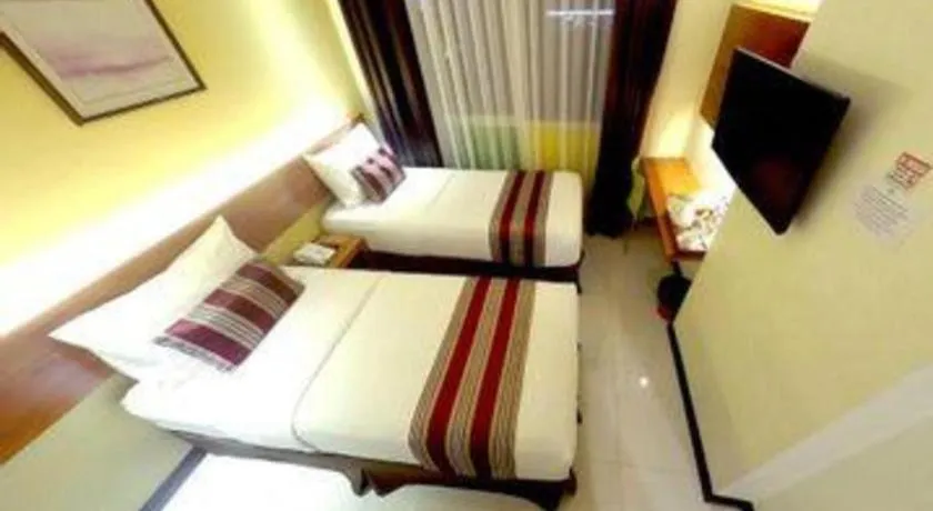 Bed in Biz Boulevard Hotel