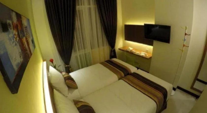 Bed in Biz Boulevard Hotel