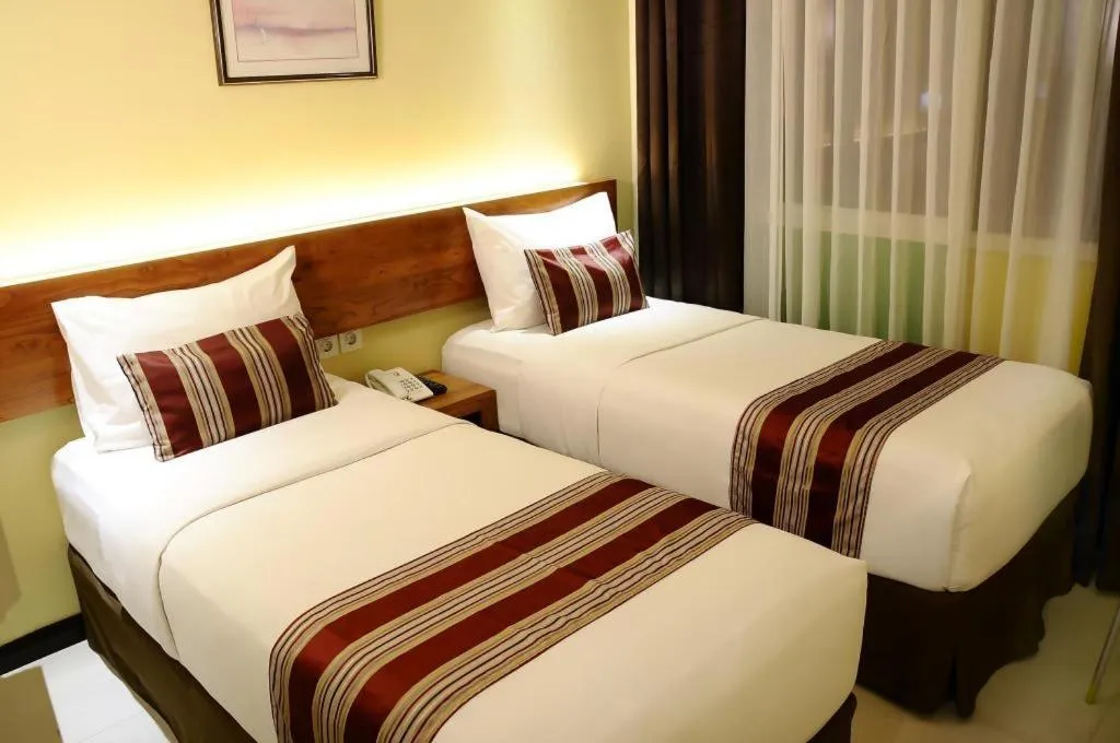 Bed in Biz Boulevard Hotel