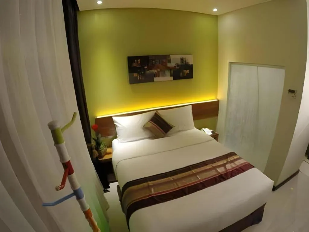 Bed in Biz Boulevard Hotel