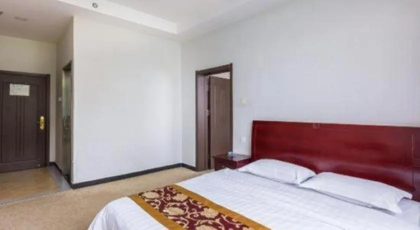 Bed in 169 Business Hotel