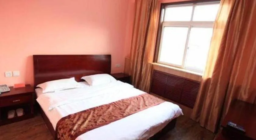 Bed in 169 Business Hotel